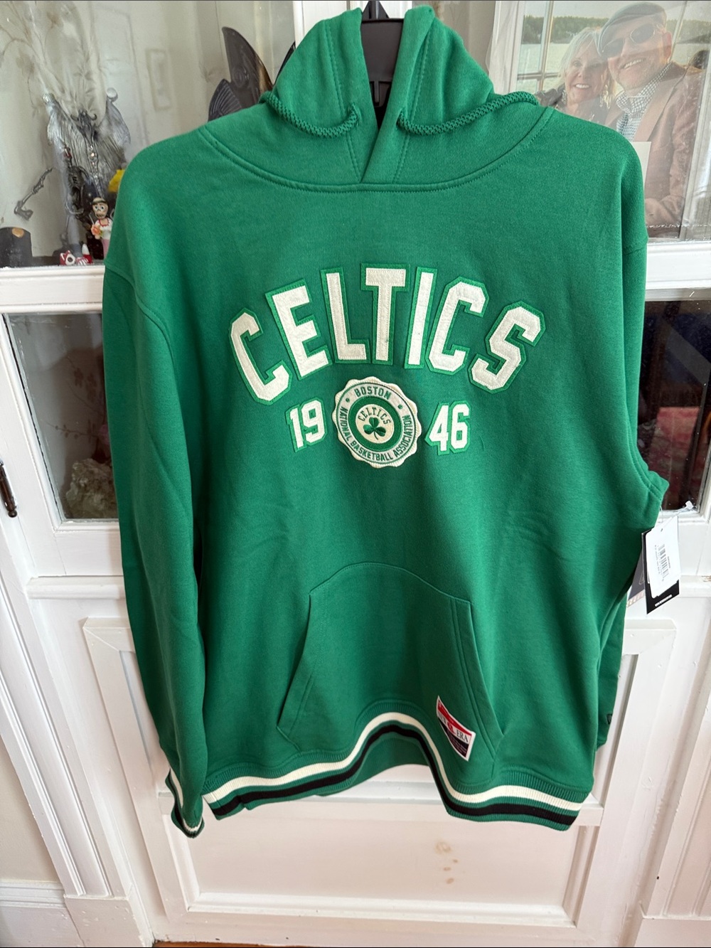 New Era Green Boston Celtics hooded Sweatshirt with White Accents. NWT